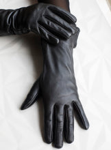 Load image into Gallery viewer, Black leather gloves /fur lining /cuffed with real fur /professional dry clean only /European made 
