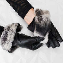 Load image into Gallery viewer, Black leather gloves /fur lining /cuffed with real fur /professional dry clean only /European made 
