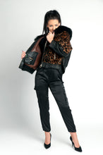 Load image into Gallery viewer, Leather with Real fur jacket /Black and  Animal printed /dry clean only European made 
